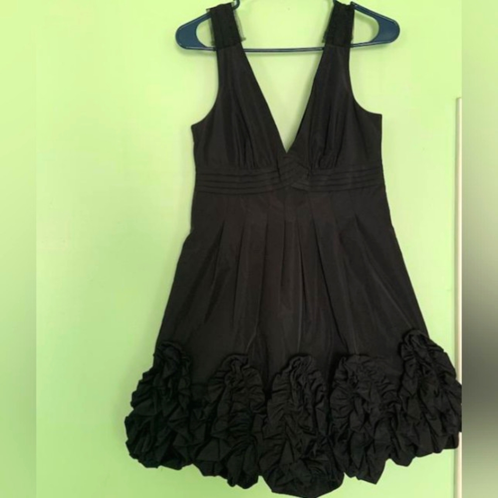 Beautifully detailed black BCBGMaxazaria dress